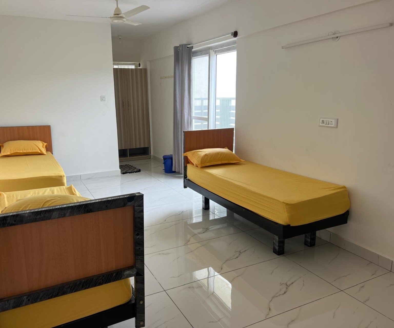 Shared room with separate beds and balcony